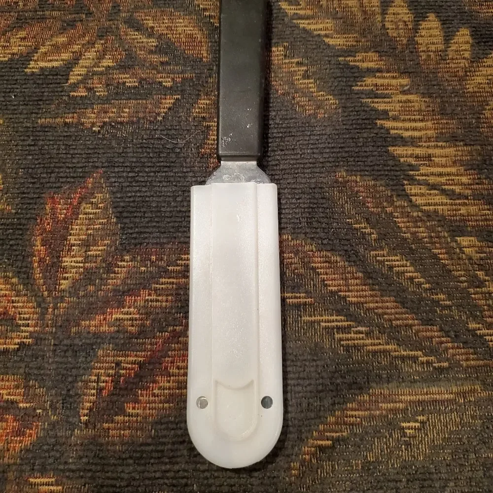 Pampered Chef Cheese knife spreader